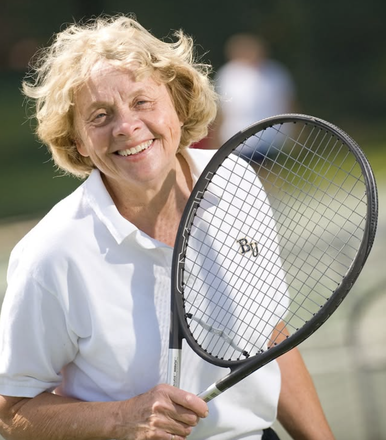 Dottie Haugen posing with tennis racquet